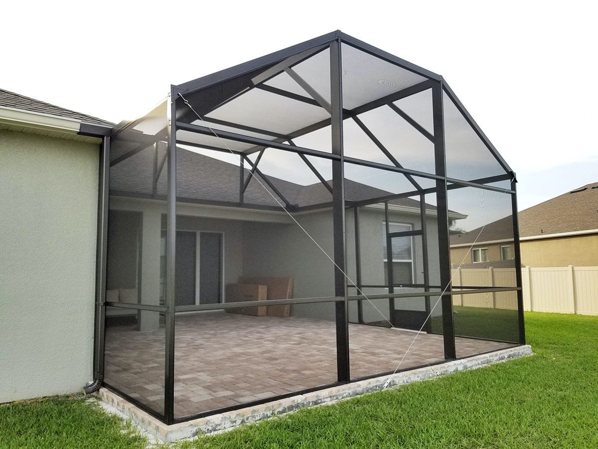newly built lanai enclosure in Davie, FL featuring weather resistant mesh and black aluminum frame