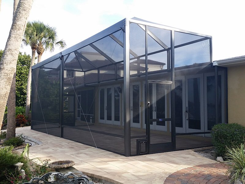 Lanai enclosure extension installation in Davie, FL attached to residential home